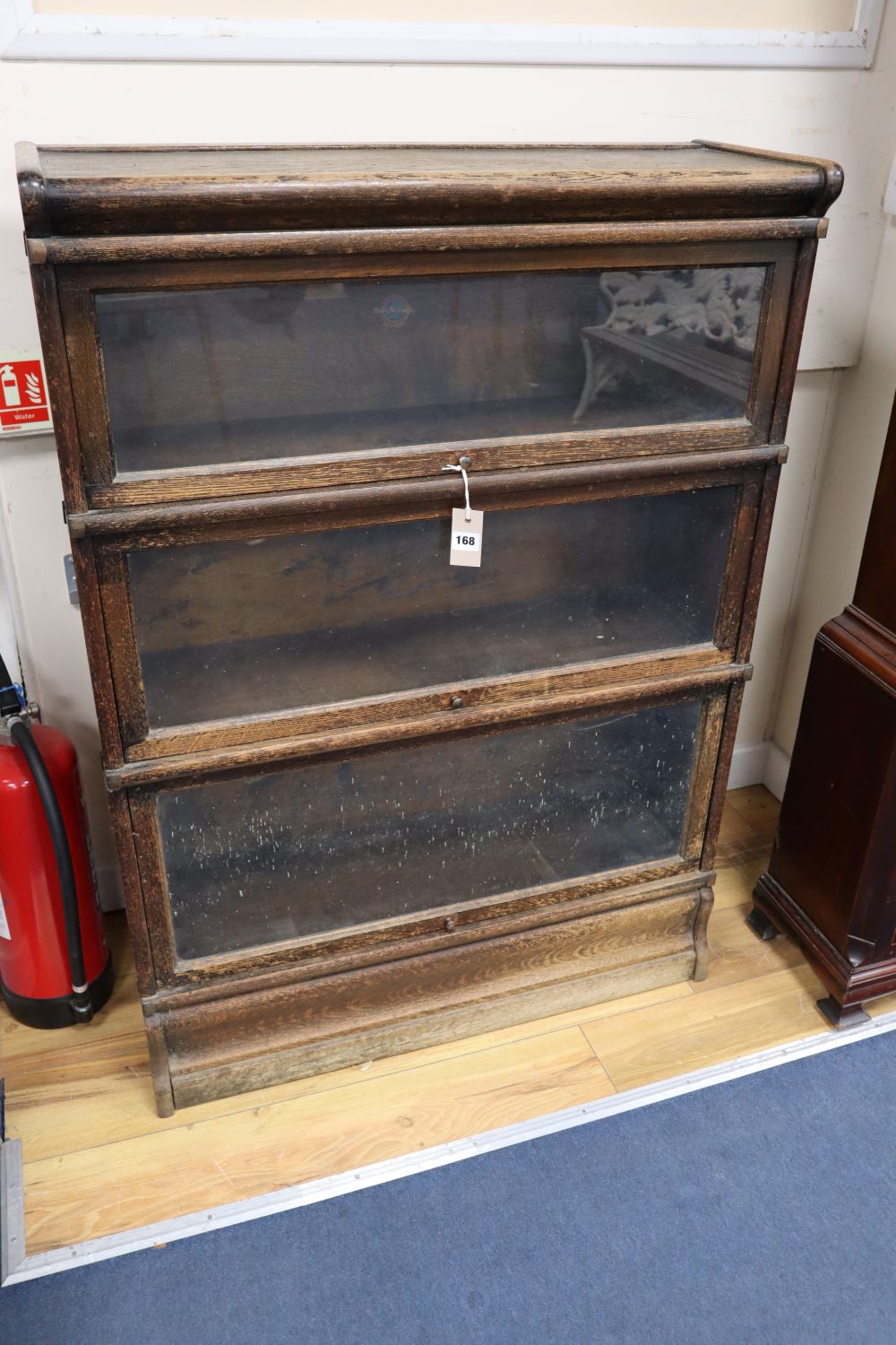 An oak Globe Wernicke three tier bookcase, width 87cm